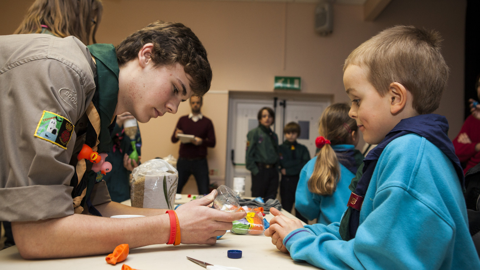 Young leader explorer with beaver scout jpg.JPG